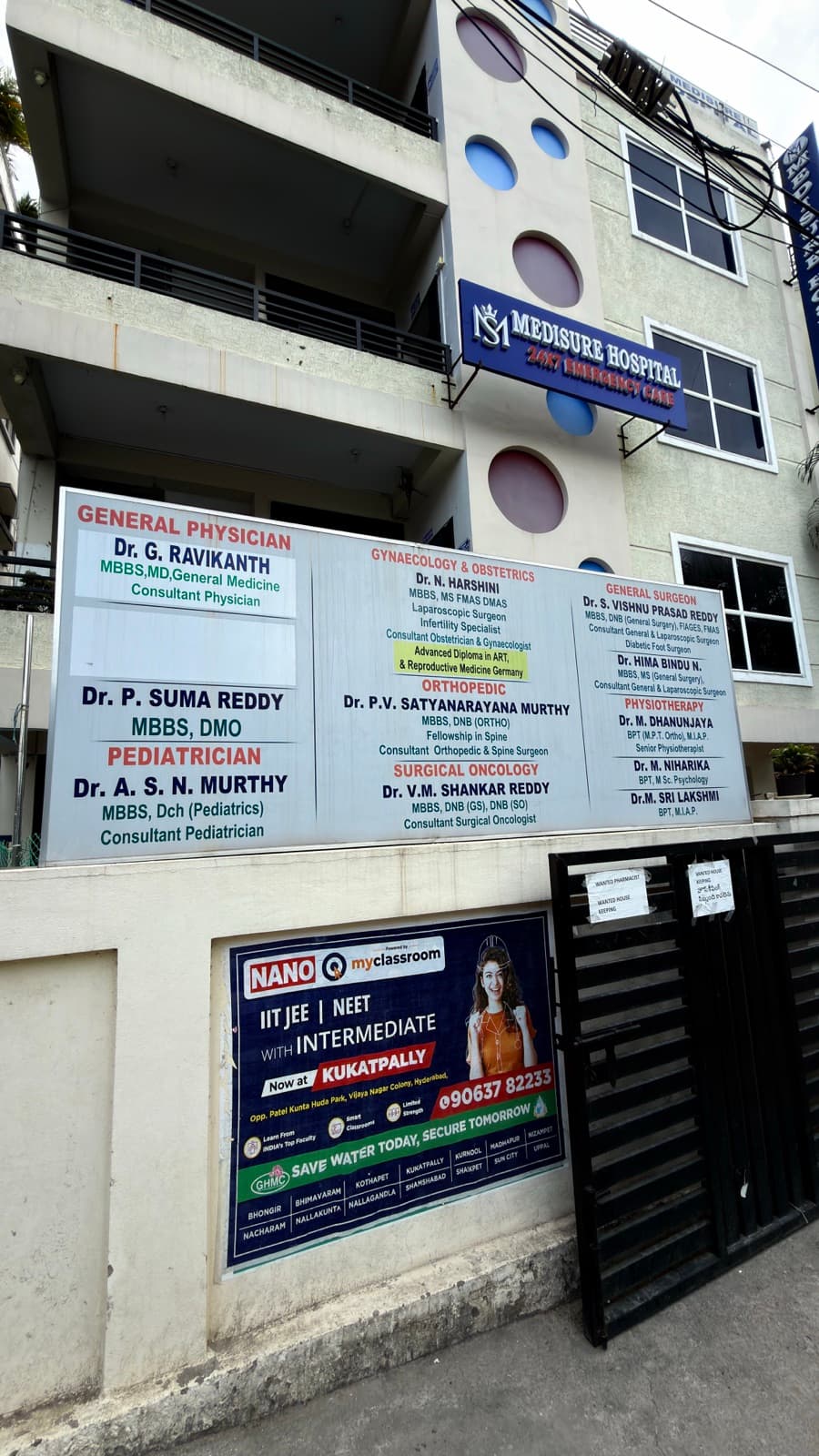 The consultant board at the entrance — general medicine, gynaecology, orthopaedics, surgical oncology, general surgery, paediatrics and physiotherapy.